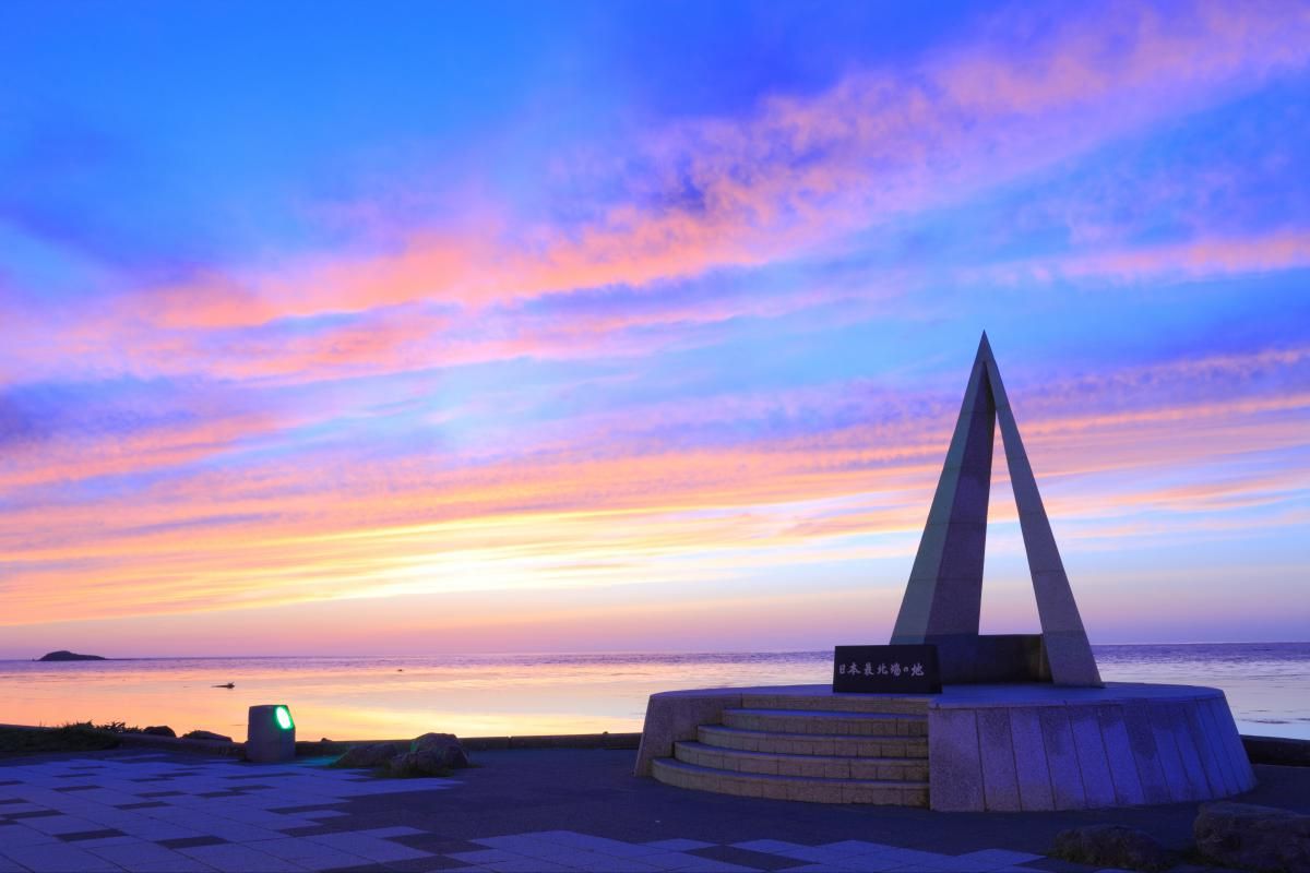 The sea at dusk and the monument at Cape Soya