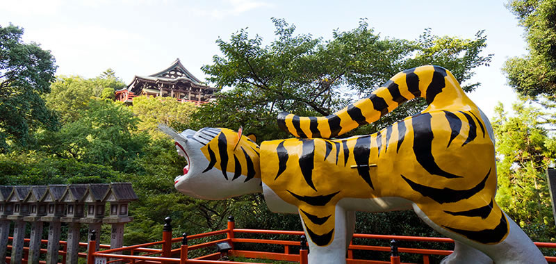 Chogosonji Temple and a statue of a tiger on Mt. Shigi