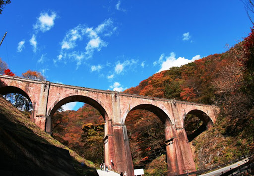 Megane Bridge surrounded by autumn foliage