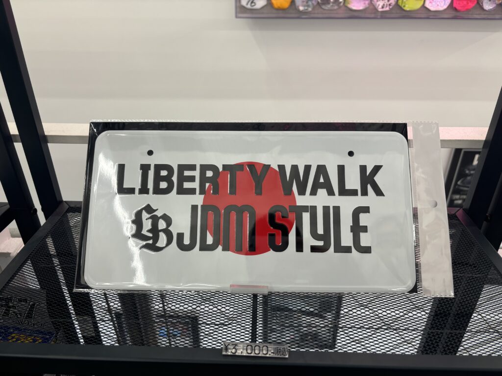 White plaque with Liberty Walk written on it.