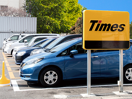 Times parking lot featuring multiple parked vehicles